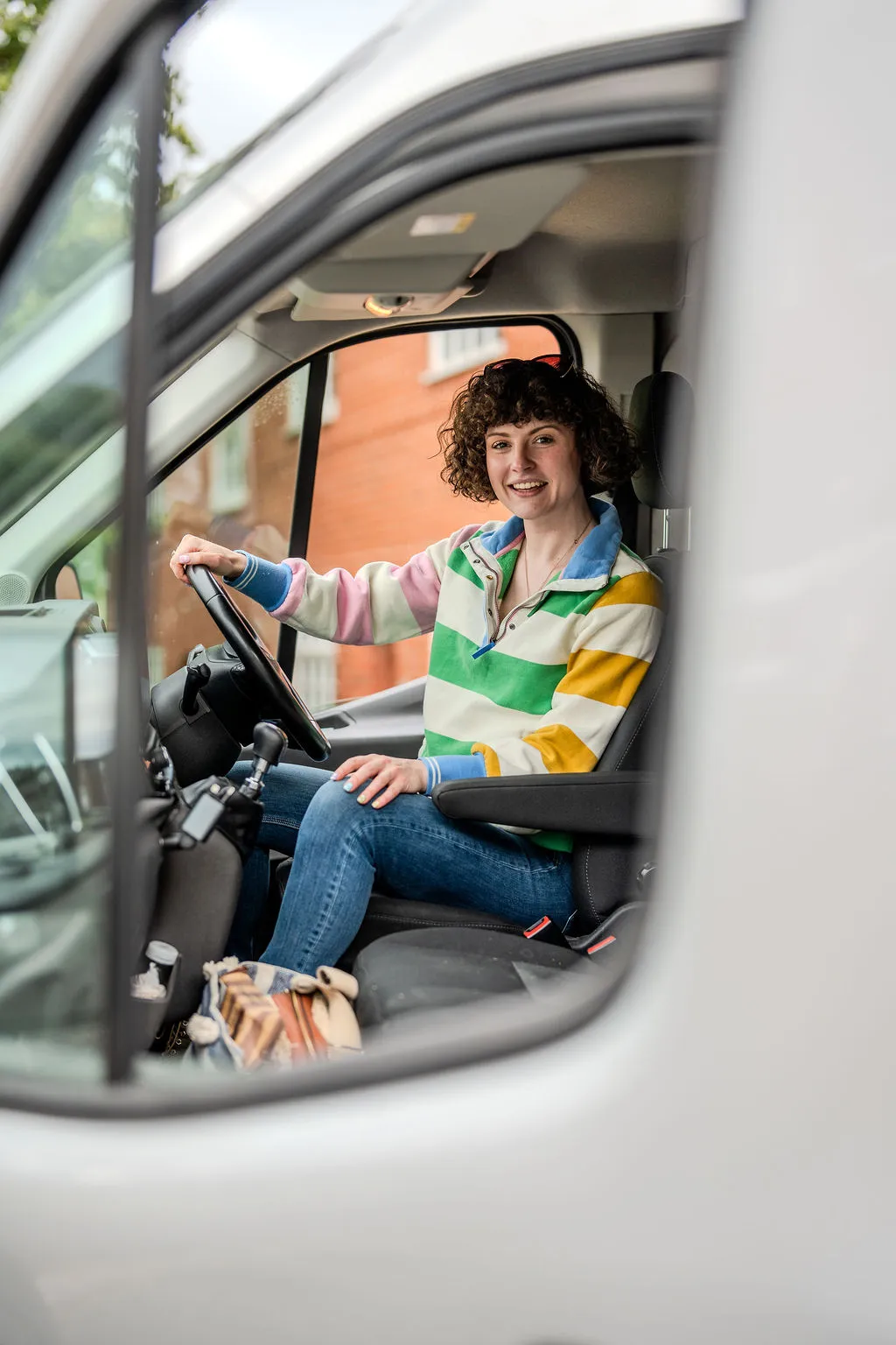 Hannah, founder of Han With A Van, with her moving van.